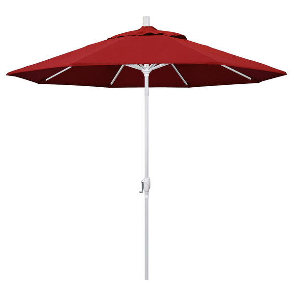 A close-up of a red California Umbrella on a white pole.