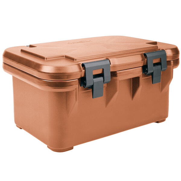 A brown plastic box with black handles.