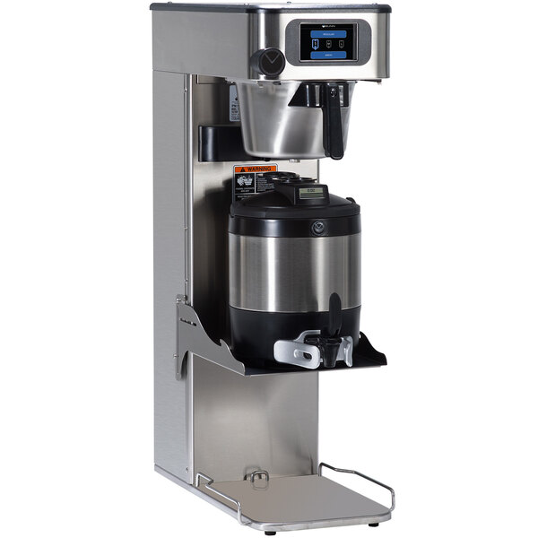 A Bunn ITCB-DV Platinum Edition coffee and tea brewer on a stainless steel shelf.