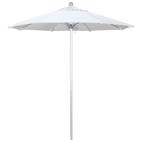 A white California Umbrella on a silver pole.