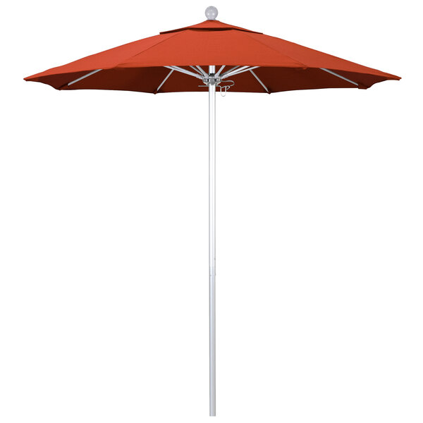 A red California Umbrella with a Sunset fabric canopy on a silver pole.