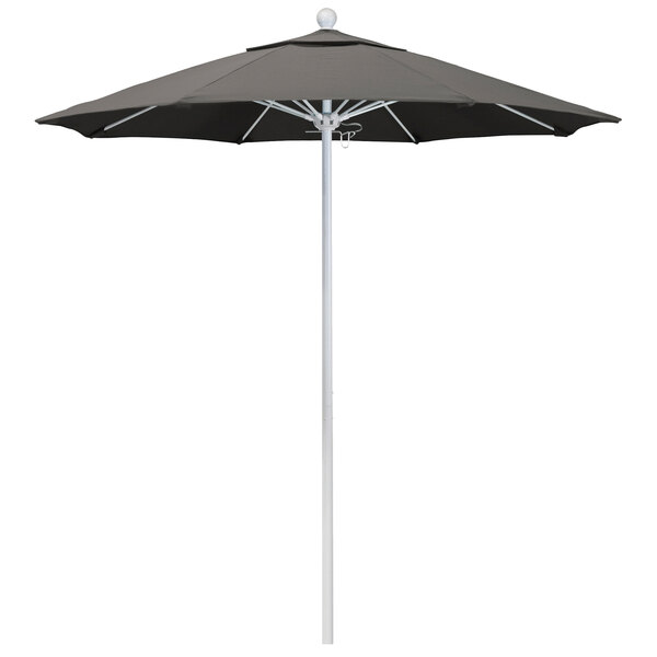A black umbrella on a white pole.