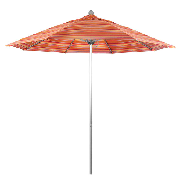 A California Umbrella with orange and white stripes on a silver pole with an orange striped canopy.