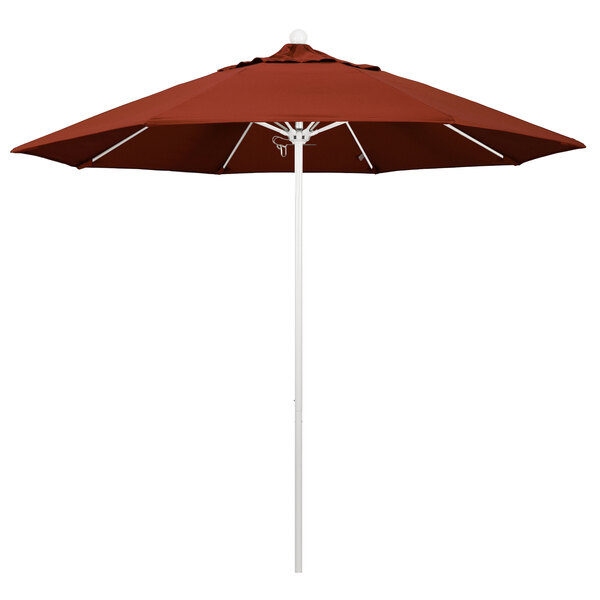 A red California Umbrella with a Sunbrella terracotta canopy on a white pole.