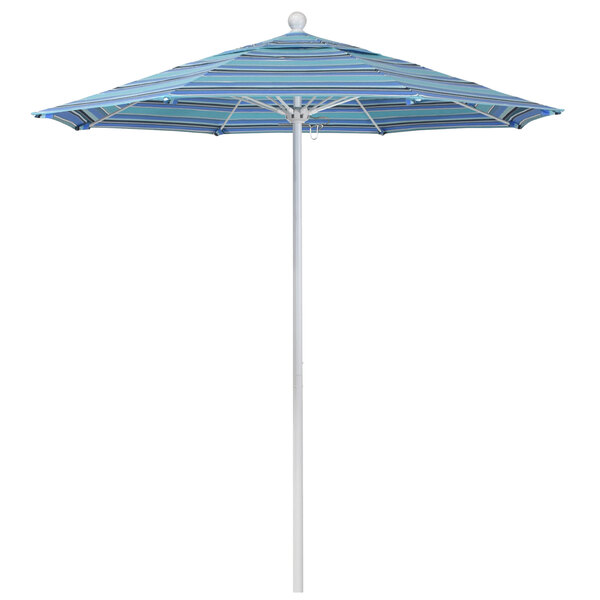 A California Umbrella with blue and white striped Sunbrella canopy on a white pole.