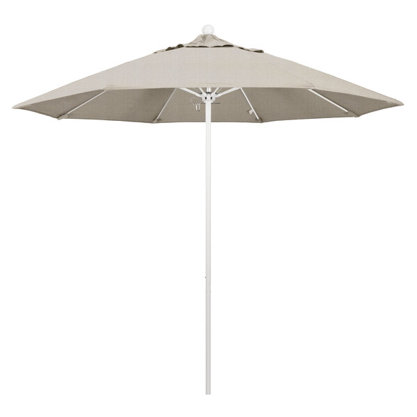 A white umbrella with a beige shade and white pole.