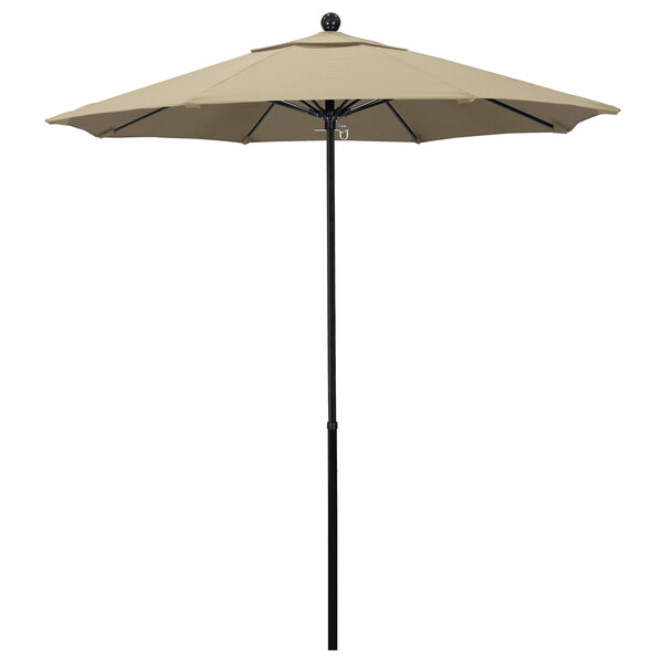 An Oceanside umbrella with Sunbrella Antique Beige canopy on a fiberglass pole.