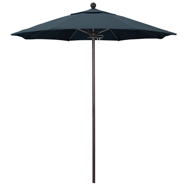 A California Umbrella with a black Pacifica canopy on a bronze pole.