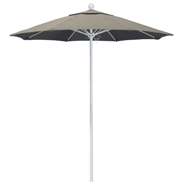 A white California Umbrella on a white pole with a black and white canopy.