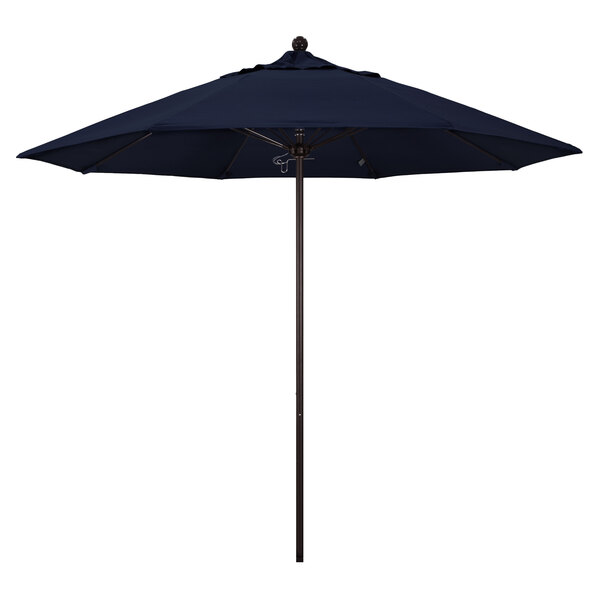 A navy blue California Umbrella with a bronze aluminum pole.