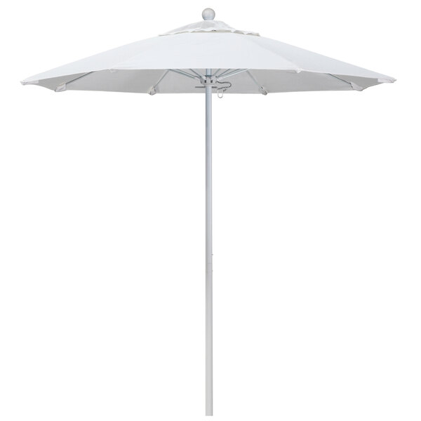 A white California Umbrella with a round Sunbrella canopy on a white pole.