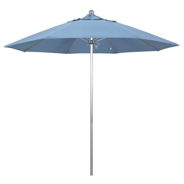 A close-up of a California Umbrella with a blue Sunbrella canopy and silver aluminum pole.