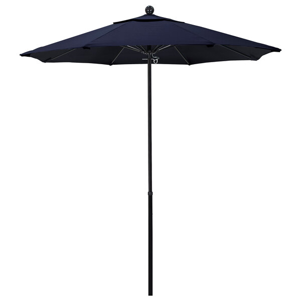 A black California Umbrella with a navy canopy on a wooden pole.