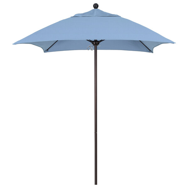 A blue California Umbrella with a black pole.