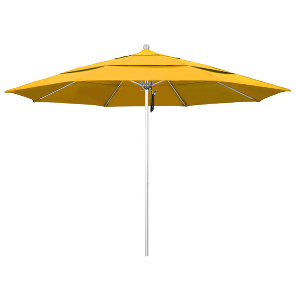 A close-up of a yellow California Umbrella with a Pacifica canopy.