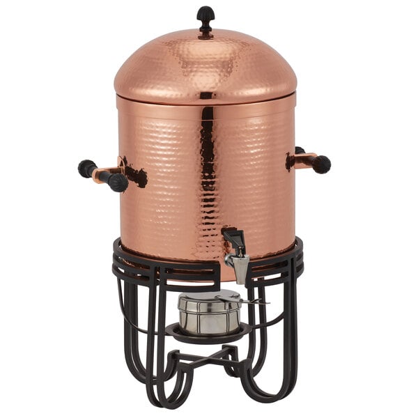 An American Metalcraft copper coffee chafer urn with a lid and stand.