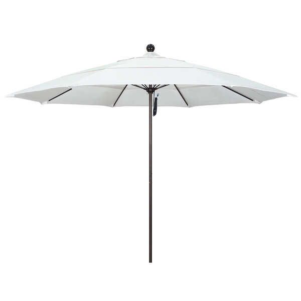 A white California Umbrella with a bronze pole and black ball on top.