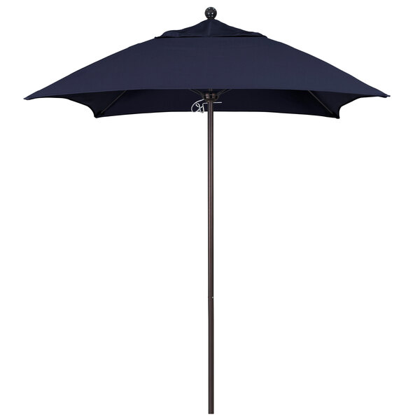 A blue California Umbrella with a bronze pole and navy blue Sunbrella canopy.