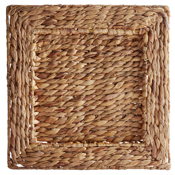 A square woven rattan charger plate with a square border.