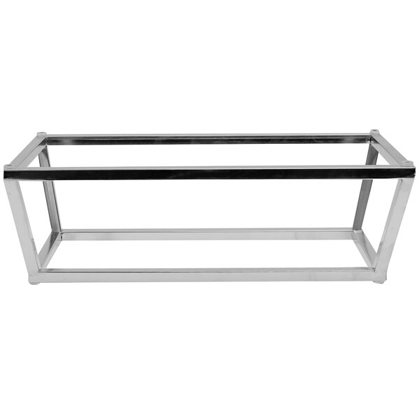 A stainless steel Tablecraft short half-long size reversible riser on a counter.