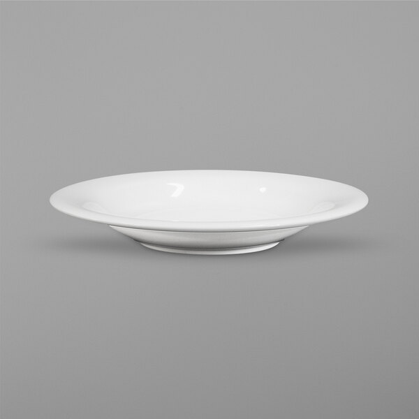 A white Elite Global Solutions pasta bowl with a rim.
