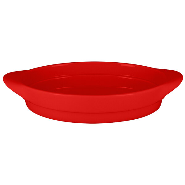 A red oval serving dish with a handle on a white background.