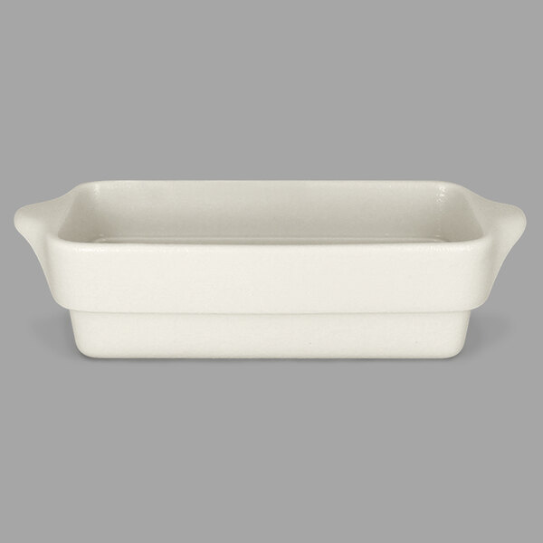 A white rectangular porcelain tureen with handles.
