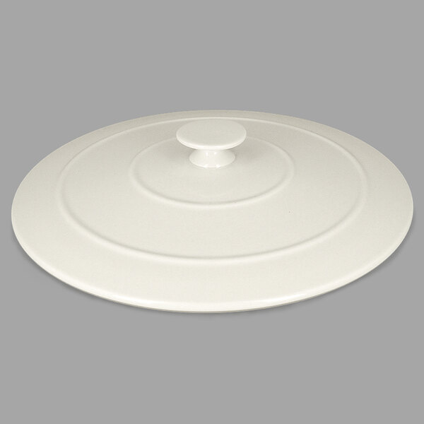 A RAK Porcelain Chef's Fusion sand white porcelain lid with a circular handle.