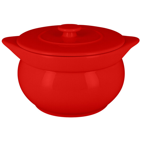 A red pot with a lid.