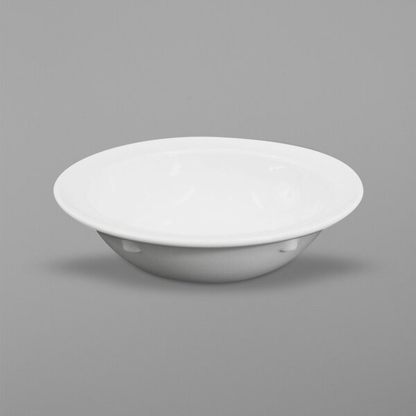 A white bowl with a handle.