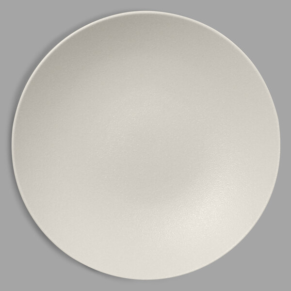A RAK Porcelain Neo Fusion deep coupe plate with a round rim on a white surface.