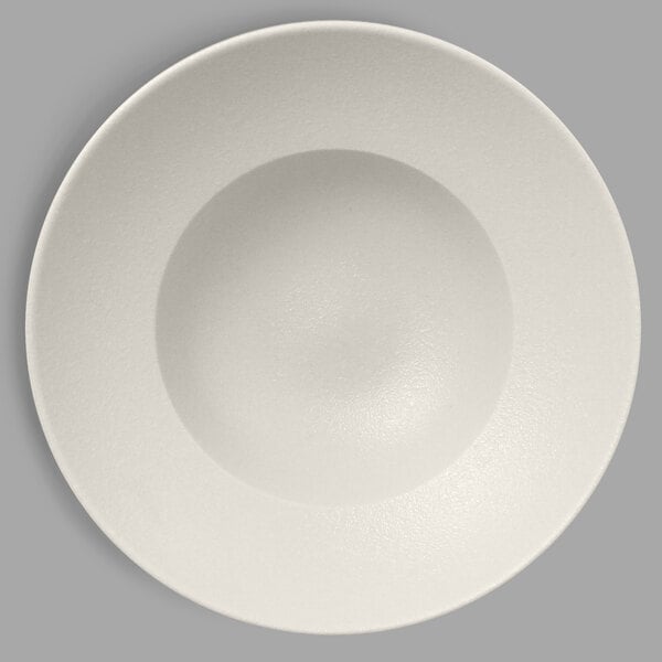 A white porcelain plate with a circular center.
