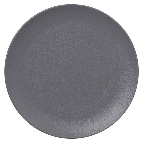 A close-up of a RAK Porcelain stone gray flat coupe plate.