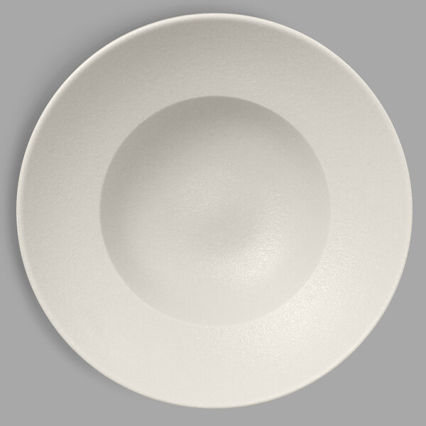 A white porcelain plate with an extra deep circular center.