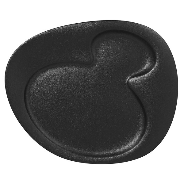 A RAK Porcelain Volcano Black porcelain plate with a curved design on it.
