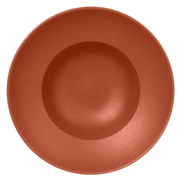 A close-up of a brown RAK Porcelain extra deep plate with a red circle on the bottom.
