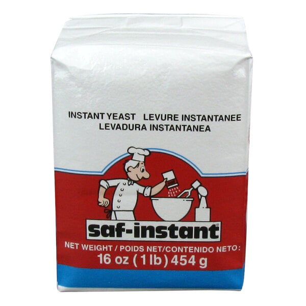 A white package of Lesaffre SAF-Instant Red Dry Yeast with a black chef illustration.