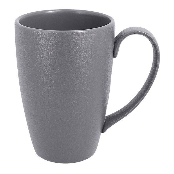A RAK Porcelain stone gray mug with a handle.