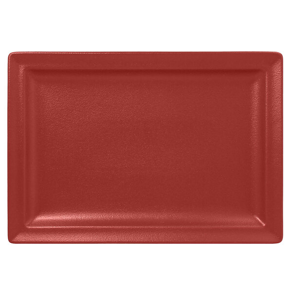 A red rectangular RAK Porcelain plate with a small rim.