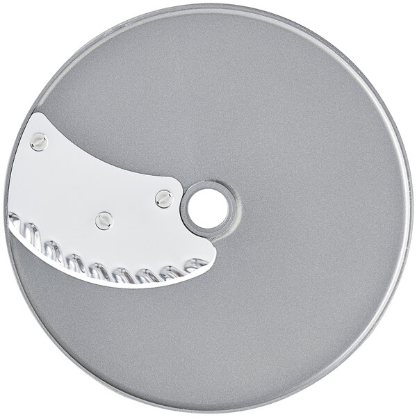 A circular silver metal Robot Coupe 3/16" Ripple Cut Disc.