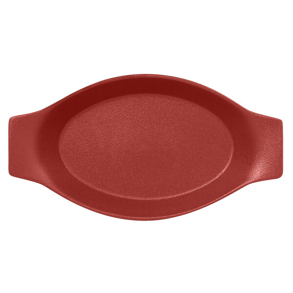 A red oval porcelain dish with handles.