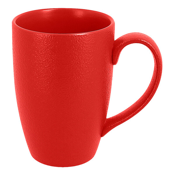 A RAK Porcelain ember red mug with a handle.