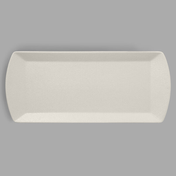 A white rectangular porcelain tray with a black border.