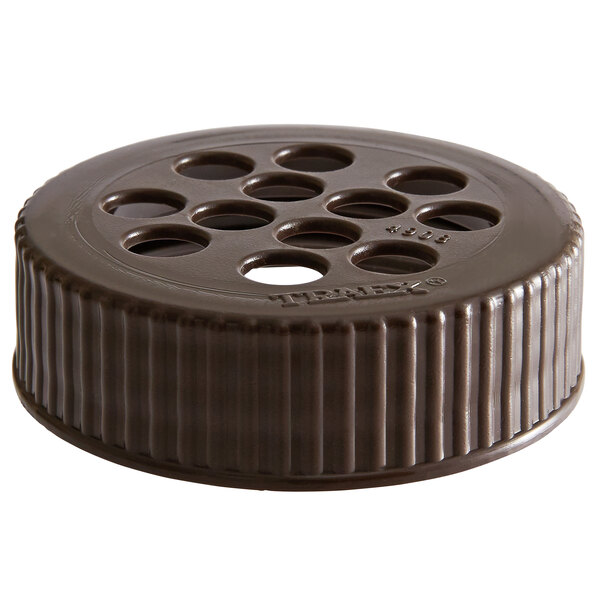 A brown plastic lid with holes for extra-coarse ground cheese.