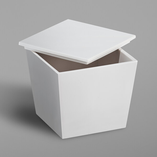 A white square Focus Hospitality Spa storage container with a lid.