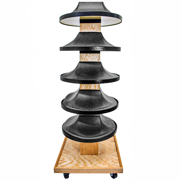 A Marco Company black display stand with wheels and shelves holding bananas.