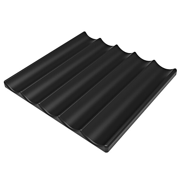 A black foam padding tile with five sections.