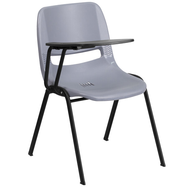 A gray Flash Furniture plastic chair with a right handed tablet arm on a black frame.
