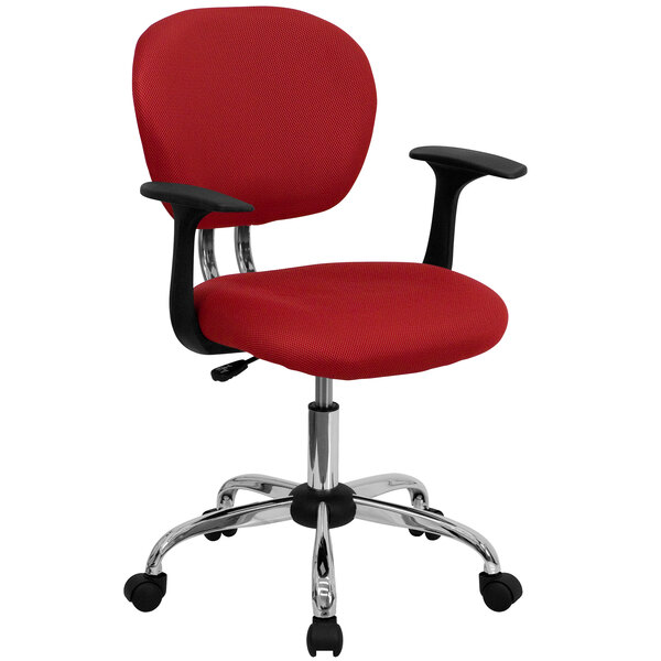 A red office chair with black armrests and a chrome base.