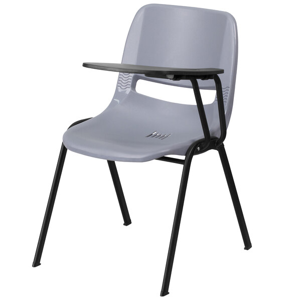 A gray Flash Furniture plastic chair with black legs and a left handed black tablet arm.